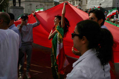 People protest in Trafalgar Square on the first anniversary of the death in custody of Mahsa Amini, a 22-year-old Kurdish woman arrested by the morality police in 2022 for allegedly flouting mandatory dress codes, in London, UK, September 16, 2023. 