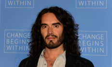 Actor Russell Brand poses on arrival with director David Lynch (not pictured) to launch “Meditation in Education”, a Global Outreach campaign to teach 1,000,000 at-risk youth “Meditation in Education“ on April 2, 2013 in Los Angeles, California. British comedian and actor Russell Brand has been accused of rape, sexual assaults and emotional abuse during a seven-year period, according to the results of a media investigation published on September 16, 2023.
