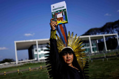 Indigenous Congresswoman Celia Xakriaba poses for a photo after a majority in Brazil's Supreme Court voted against the constitutionality of laws to limit the ability of Indigenous people to win protected status for ancestral lands, in Brasilia, Brazil September 21, 2023. 