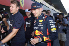 Verstappen victory secures team title for Red Bull
