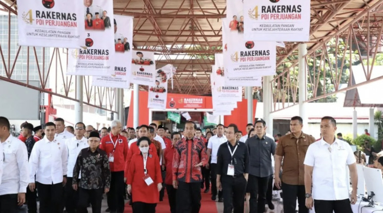 President Joko 'Jokowi' Widodo, Indonesian Democratic Party of Struggle (PDI-P) chairperson Megawati Soekarnoputri and Central Java Governor Ganjar Pranowo arrive at the venue for the party's national meeting in East Jakarta on Sept. 29, 2023.