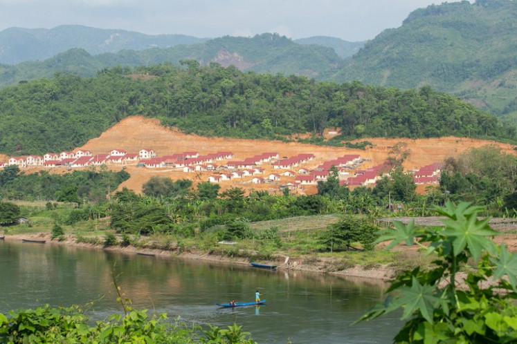 People living near the Laos-China Railway were moved to new villages, including this settlement in Buam Aor village, Xiang Ngeun district, Luang Prabang province, Laos, April 22, 2022. 