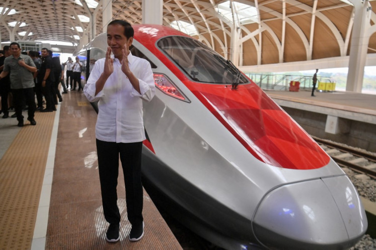 President Joko "Jokowi" Widodo gestures during a trial of the new Bandung-Jakarta high-speed train in Jakarta on September 13, 2023. 
