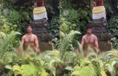 Bali authorities hunting foreigner who meditated naked at shrine