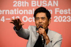Hong Kong actor Chow Yun Fat gestures during a press conference at the 28th Busan International Film Festival (BIFF) in Busan on October 5, 2023.
