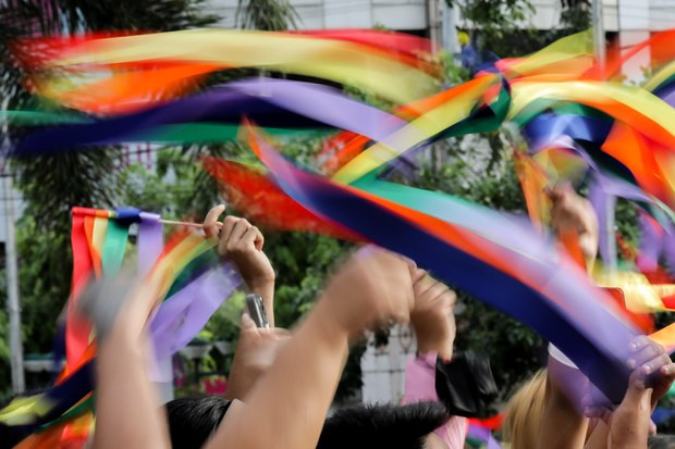 Equal rights supporters wave rainbow flags at a rally on June 2, 2023, as they mark Pride Month in Quezon City, the Philippines.