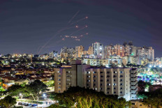 Israel's Iron Dome anti-missile system intercepts rockets launched from the Gaza Strip, as seen from Ashkelon in southern Israel October 7, 2023.