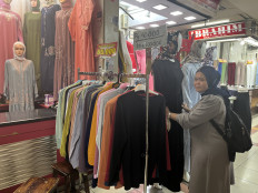 Quiet here today: Not many customers are seen at Jakarta's Tanah Abang Market on Oct. 10, 2023. Following the closure of TikTok Shop, textile merchants at the market have noticed no improvement in demand for their wares. The vendors now want the government to crack down on all e-commerce platforms.