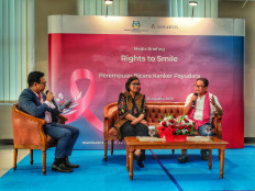 Self-examination technique: Surgical oncologist Walta Gautama Said Tehuwayu (right) speaks about women’s reluctance to perform the SADARI breast cancer examination technique while deputy head of gender equality at the Women's Empowerment and Child Protection Ministry Lenny N. Rosalin (center) and a moderator listen on Sept. 23, 2023, during a press conference at the ministry in Jakarta. 