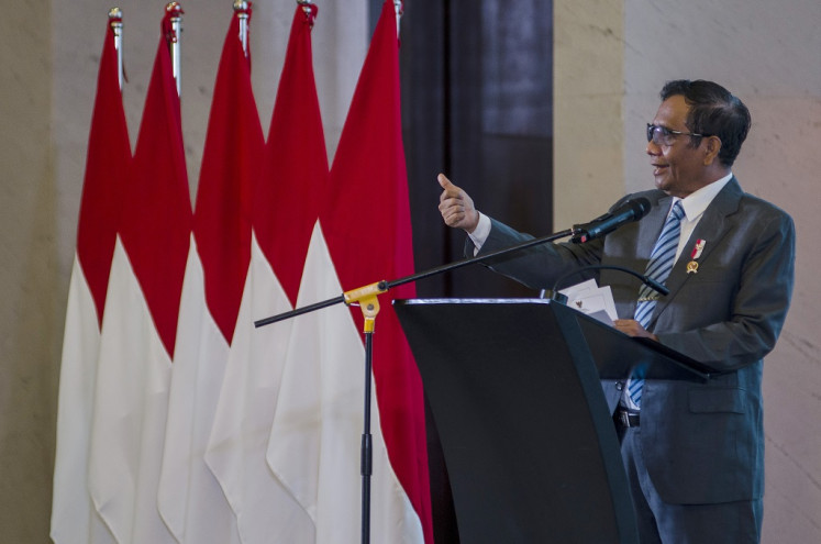 Then-coordinating political, legal and security affairs minister Mahfud MD gives a speech during an event in Bandung, West Java, on Sept. 13, 2023.

