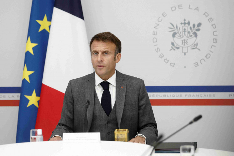French President Emmanuel Macron attends a video-conference with the families of French hostages by the Hamas militants who had entered Israel from the Gaza Strip, at the Elysee Palace in Paris, France, October 20, 2023. REUTERS/Benoit Tessier/Pool