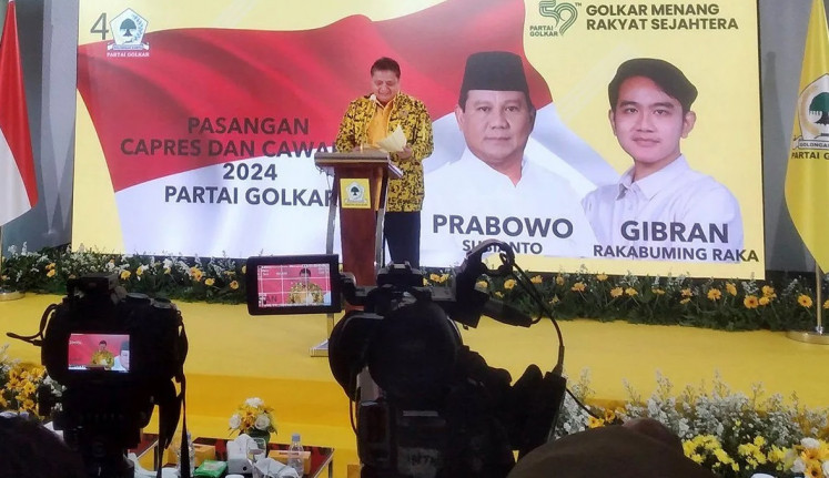 Golkar Party chairman Airlangga Hartarto reads out the party’s decision to back Prabowo Subianto and Gibran Rakabuming Raka for the 2024 presidential election at an event on Oct. 21, 2023 in Jakarta.