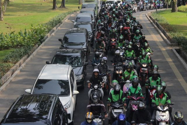 Boxed in: Cars and motorcycles throng a road heading to the Semanggi underpass in Jakarta on Oct. 10, 2023.