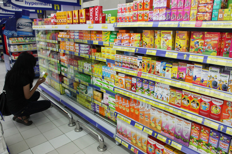 Consumer chooses medicine at a Hypermart in Jakarta, on March 26, 2025. Imports of pharmaceutical raw materials are estimated to increase by 15 percent in the first quarter of 2013 to US$335.8 million from the same period in 2012 of US $292 million, due to high demand for medicine in the domestic market.
