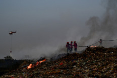 Rawa Kucing fire dwindles as regions lend hand