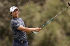 Ryo Ishikawa of Japan plays his shot from the 12th tee during the second round of the 123rd US Open Championship at The Los Angeles Country Club on June 16, 2023, in Los Angeles, California, the United States.