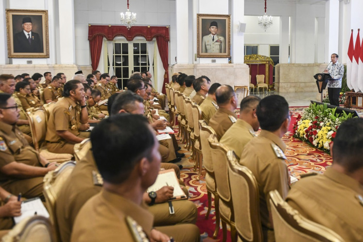 President Joko “Jokowi“ Widodo (right) gives a speech to 197 acting regional heads at the State Palace in Jakarta on Oct. 30, 2023. The President asked the regional administrators “not to pick sides“ in the 2024 elections.