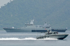 Managing power conflict spillover in Straits of Malacca and Singapore