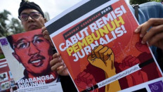 Police in North Sumatra probe arson accusation in death of reporter