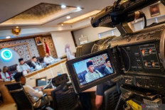 The Indonesian Ulema Council (MUI) chairman of fatwa (edict) Asrorun Niam Sholeh delivers an edict on Nov. 11, 2023, declaring that it is haram (forbidden) to buy products  that are perceived to support Israeli aggression against the Palestinians, in Jakarta. 