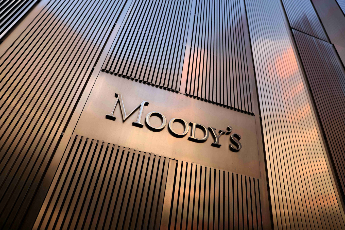 Signage is seen outside the Moody's Corporation headquarters in Manhattan, New York, the United States, on Nov. 12, 2021.
