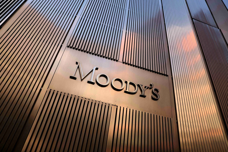 Signage is seen outside the Moody's Corporation headquarters in Manhattan, New York, the United States, on Nov. 12, 2021.