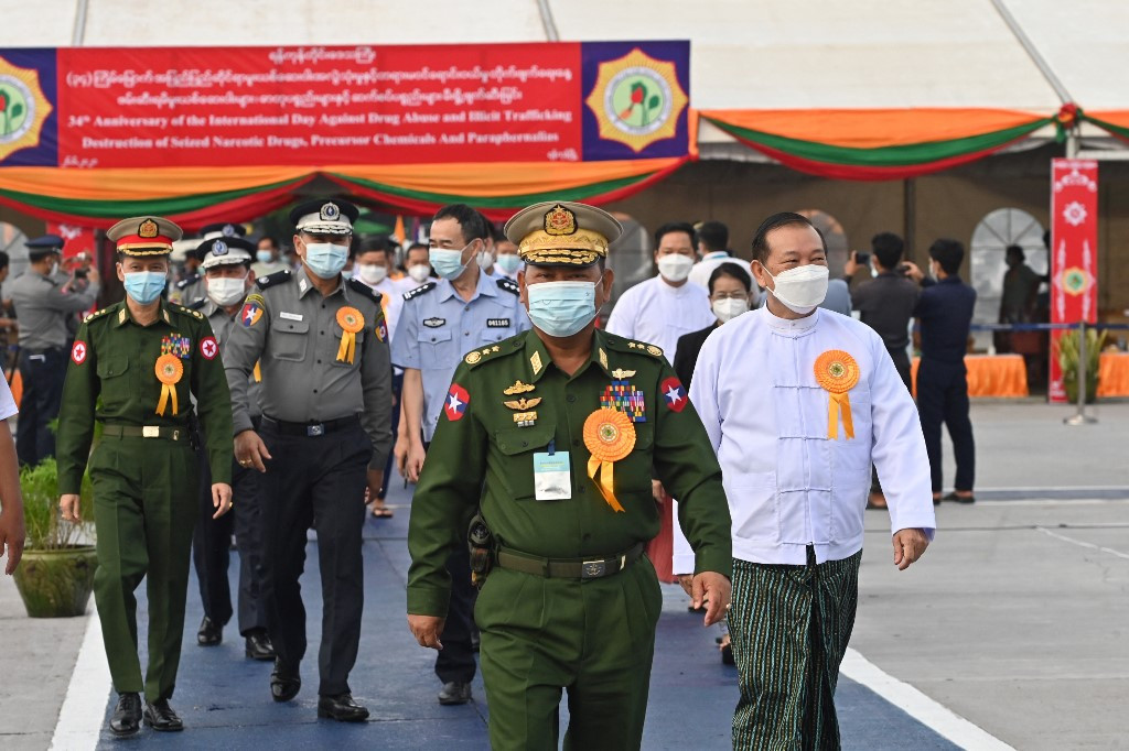 Then-Burmese Minister of Home Affairs lieutenant general Soe Htut (center) attends a destruction ceremony to mark the United Nations' International Day against Drug Abuse and Illicit Trafficking in Yangon, Myanmar on June 26, 2021.