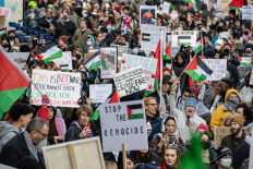 Demonstrators rally in support of Palestinians in Boston, Massachusetts, US, on November 12, 2023. In Gaza City on the same day, Al-Shifa hospital is caught in Israel's ground offensive aimed at destroying Hamas, and the compound has been repeatedly hit by strikes, one of which Hamas health officials said destroyed the cardiac ward.