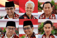 Presidential candidates (from top left to right) Anies Baswedan, Ganjar Pranowo and Prabowo Subianto, and vice presidential candidates (from bottom left to right) Muhaimin Iskandar, Mohammad Mahfud Mahmodin and Gibran Rakabuming Raka register on Oct. 19, 2023, at the General Election Commission (KPU) headquarters in Jakarta.