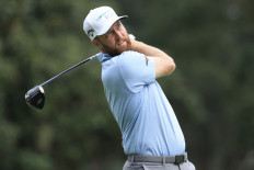 Chris Kirk of the United States hits a tee shot on the 18th hole during the first round of The RSM Classic on the Plantation Course at Sea Island Resort on Nov. 16, 2023, in St Simons Island, Georgia, the US.