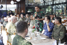 Indonesian Military (TNI) International Military Center (Puskersin) chief Air Cdre. Benny Arfan delivers a speech during a gathering for military attachés from friendly countries in Cisarua, Bogor regency, West Java, on Nov. 29, 2023. Benny said the TNI had forged bilateral military cooperation with 54 countries.