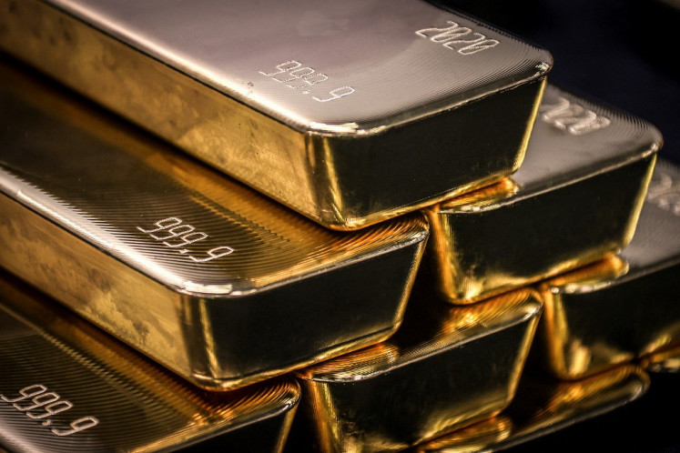 Gold bullion bars are pictured after being inspected and polished at the ABC Refinery in Sydney on Aug. 5, 2020.