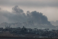 A picture taken from southern Israel near the border with the Gaza Strip on December 4, 2023, shows smoke billowing during Israeli bombardment in Gaza amid continuing battles between Israel and the militant group Hamas.