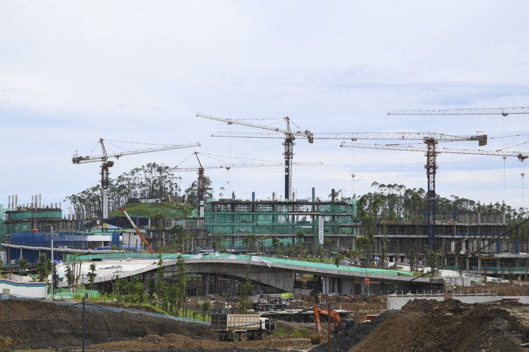 Cranes make up the skyline of the Nusantara Central Government Area (KIPP) of Nusantara, the future capital city in North Penajam Paser regency, East Kalimantan on Dec. 7, 2023 . 