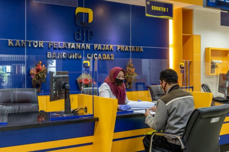 Tax matters: A tax officer provides consultancy services on Sept. 1, 2020, at the regional chapter (KKP) of the Taxation Directorate General (DJP) in the Cicadas area of West Java’s capital, Bandung.