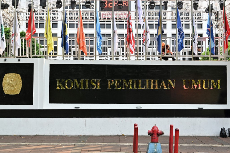 Flags of political parties are seen at the office of Indonesia's General Elections Commission (KPU) in Jakarta on November 13, 2023. 