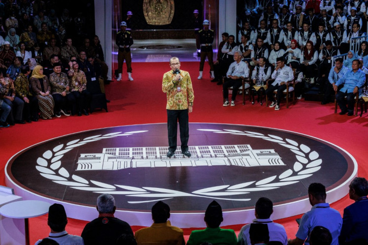 General Elections Commission (KPU) chairman Hasyim Asy'ari delivers an opening speech on Dec. 12, 2023 at the first presidential debate at the KPU’s Jakarta headquarters.
