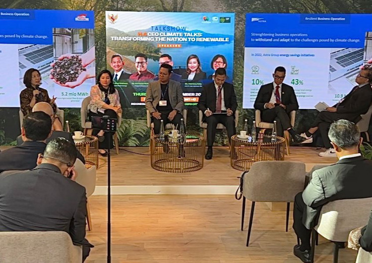 Astra's director Gita Tiffani Boer (left) sits with fellow speakers during the talk show session on the topic Support Indonesia's Transition to a Sustainable Future: Private Sector Contribution in Climate Action and Partners at the Indonesian Pavilion at COP28 held at Expo City Dubai in Dubai, the United Arab Emirates, on Nov. 30.
