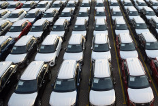 Awaiting consumers: Multipurpose vehicles are parked at Tanjung Priok Port's car terminal in Jakarta on Dec. 15, 2023. (Antara/
