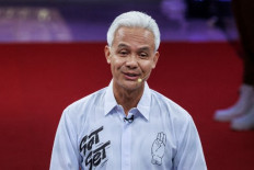 Presidential candidate and former Central Java governor Ganjar Pranowo speaks on Dec. 12, 2023, during the first presidential election debate at the General Elections Commission (KPU) office in Jakarta.