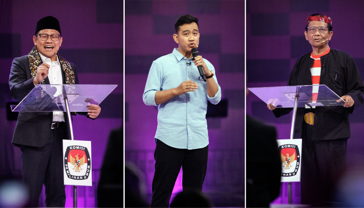 In this combination of photos, vice presidential candidates  Muhaimin Iskandar (left), Gibran Rakabuming Raka (center) and Mahfud MD speak on Dec. 23, 2023, during a televised debate at the Jakarta Convention Center in Jakarta.