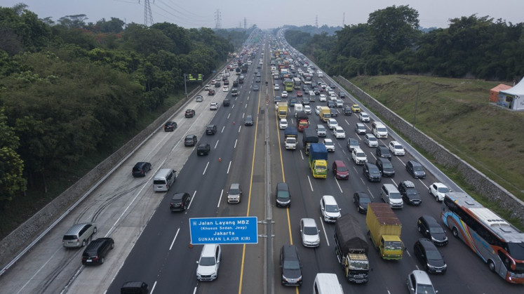 A section of Jakarta-Cikampek toll road in Karawang, West Java, sees a high volume of vehicles on Dec. 23, 2023, which authorities estimate to be the peak of the 2023 year-end holiday travel.