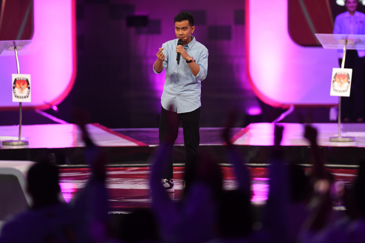 Vice presidential candidate Gibran Rakabuming Raka speaks during the second 2024 election debate at the Jakarta Convention Center on Dec. 22, 2023. The debate covered issues related to the economy, finance, tax, investment, trade and infrastructure.