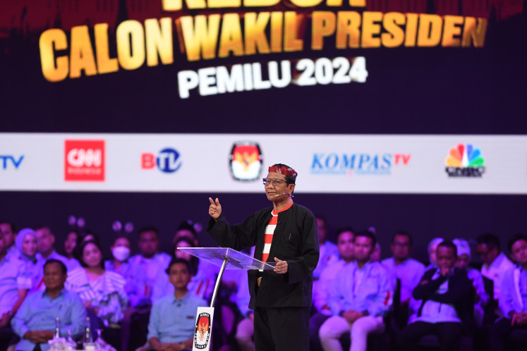 Vice presidential candidate Mahfud MD speaks during the second 2024 election debate at Jakarta Convention Center on Dec. 22, 2023. The debate covered issues related to the economy, finance, tax, investment, trade and infrastructure.