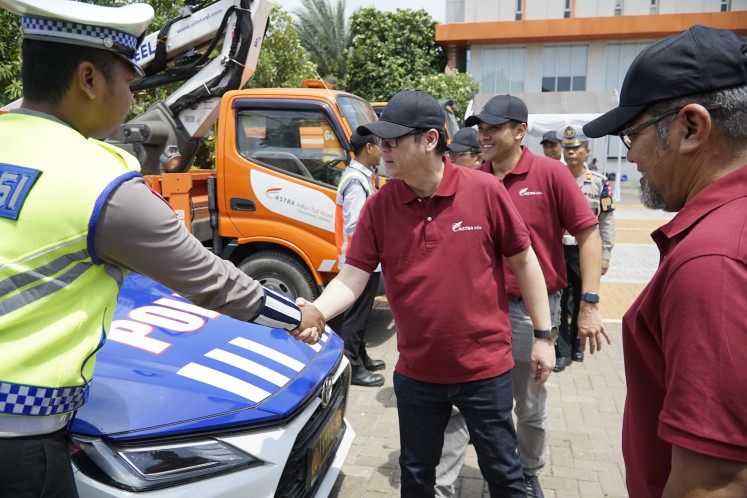 ASTRA Infra Group CEO Firman Yosafat Siregar, alongside Group COO Billy Perkasa Kadar, and head of the Nataru Task Force ASTRA Infra Group Rinaldi, conduct a fleet readiness check for ASTRA Infra Group's Nataru operations during the media gathering held by ASTRA Infra Group at the Tangerang-Merak toll road office in Ciujung, Serang, on Dec. 19.