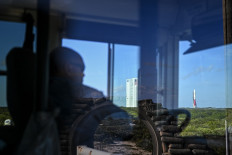 Rocket carrying American lunar lander arrives at launchpad