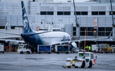 An Alaska Airlines Boeing 737 MAX 9 plane sits at a gate at Seattle-Tacoma International Airport on Jan. 6, 2024 in Seattle, Washington, US.