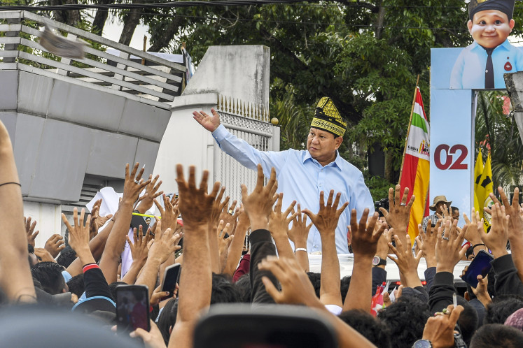 Presidential candidate Prabowo Subianto greets supporters on Jan. 9, 2024 at a campaign event in Pekanbaru, Riau.