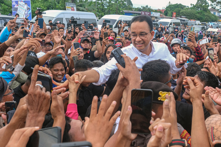 Presidential candidate Anies Baswedan greets his supporters during a campaign event in Kendari, Southeast Sulawesi, on Jan. 9, 2024. 