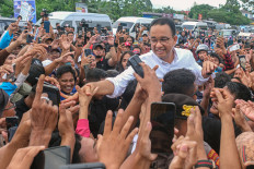 Presidential candidate Anies Baswedan greets his supporters during a campaign event in Kendari, Southeast Sulawesi, on Jan. 9, 2024. 